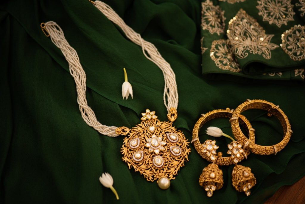 Polki-Gold-diamond-Jewellery-with-Jhumkis-Gold-Bangles